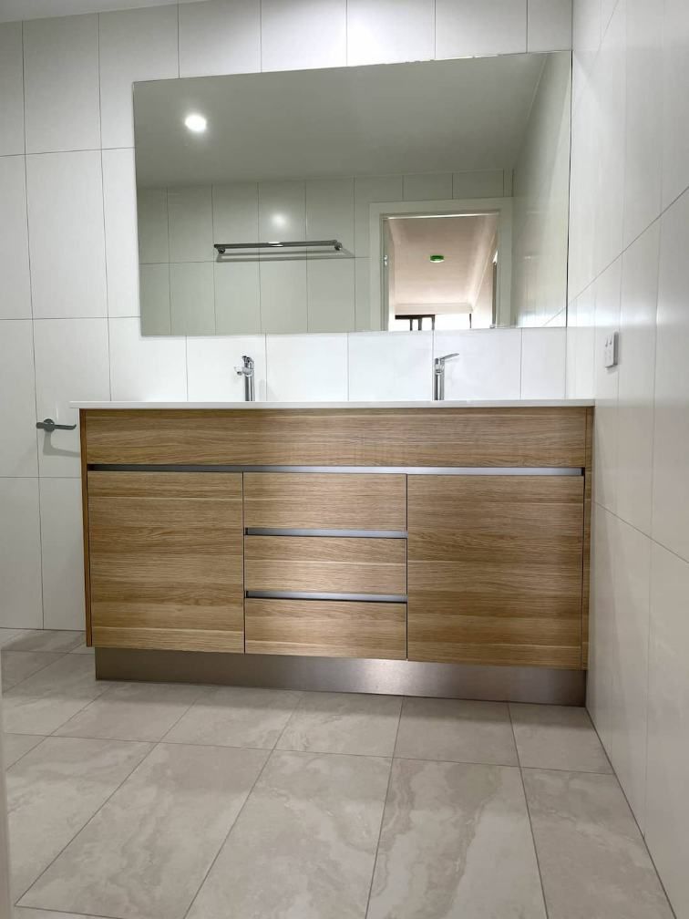 Brown Cabinet In The Bathroom — Nyblad Construction in Caloundra West, QLD