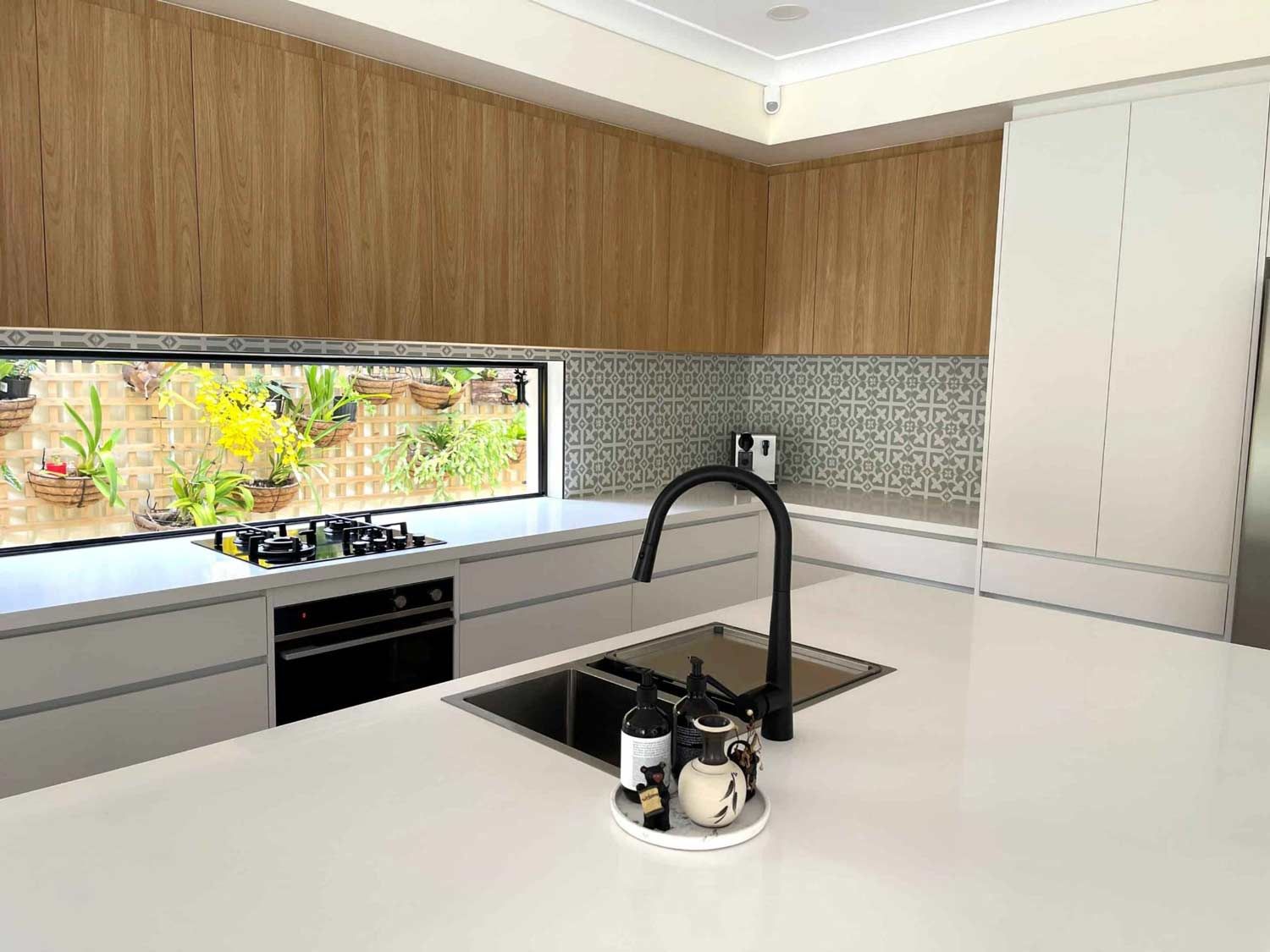 Black Faucet On The Kitchen Sink — Nyblad Construction in Caloundra West, QLD