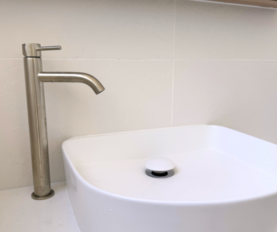 Tall Brushed Nickel Faucet Over a White, Square, Bowl Sink Against White Tile — Nyblad Construction in Caloundra West, QLD