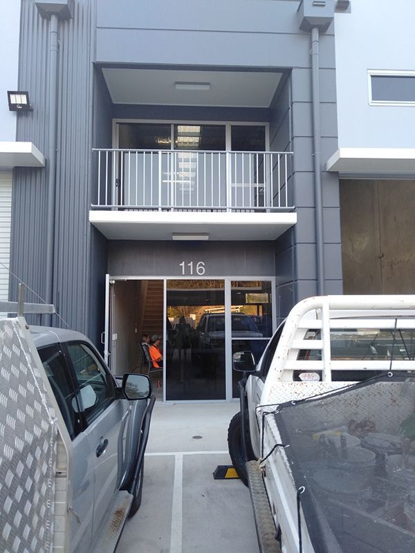 A Building With The Number 116 On It  — Nyblad Construction in Caloundra West, QLD