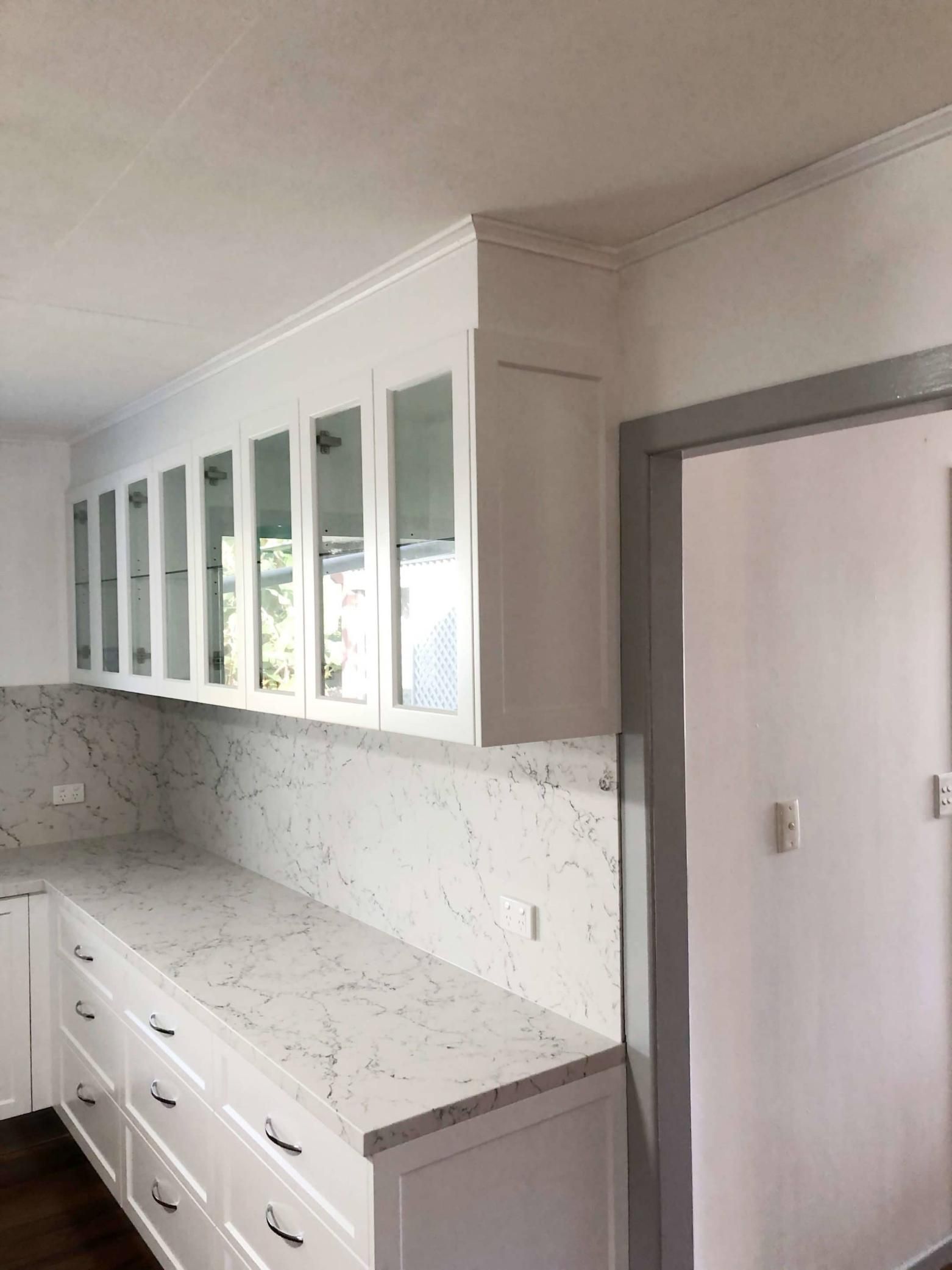 Kitchen With White Cabinets — Nyblad Construction in Caloundra West, QLD