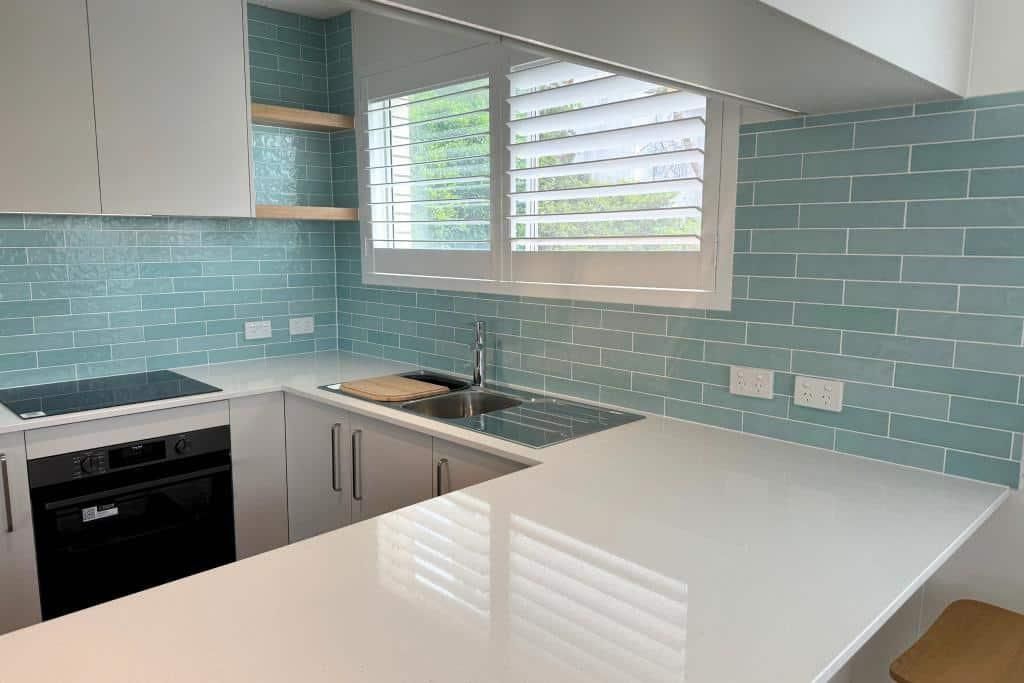 Kitchen With Blue Tiles — Nyblad Construction in Caloundra West, QLD