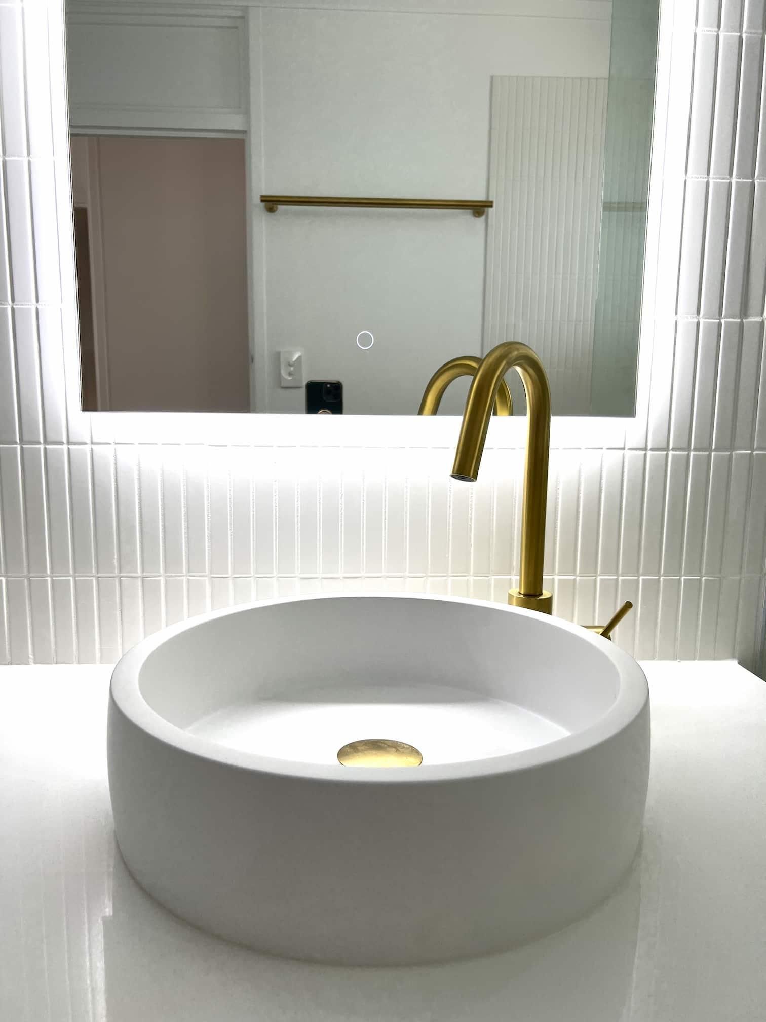 Bathroom With a Round Sink — Nyblad Construction in Caloundra West, QLD