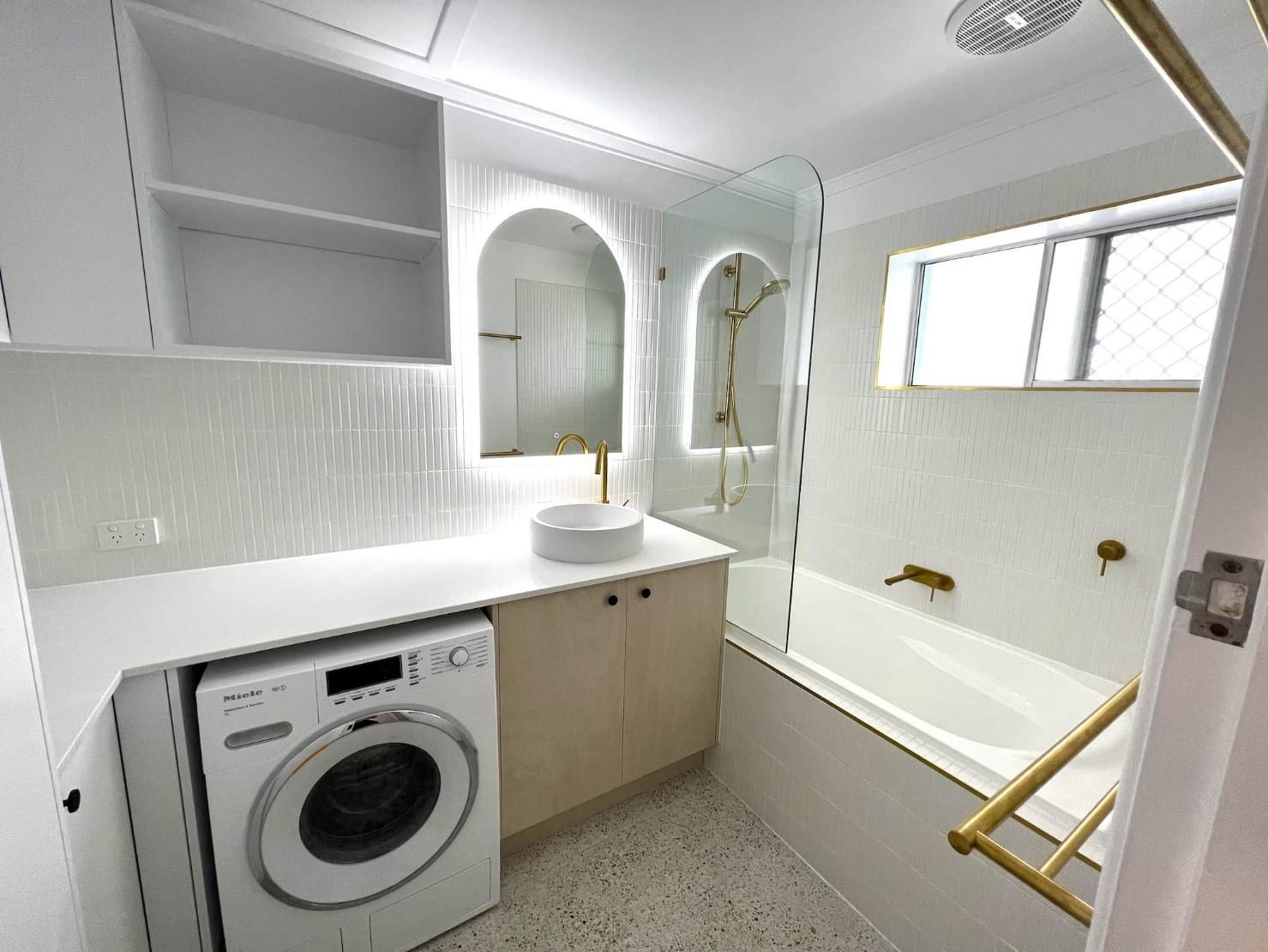 Bathroom With a Washing Machine — Nyblad Construction in Caloundra West, QLD