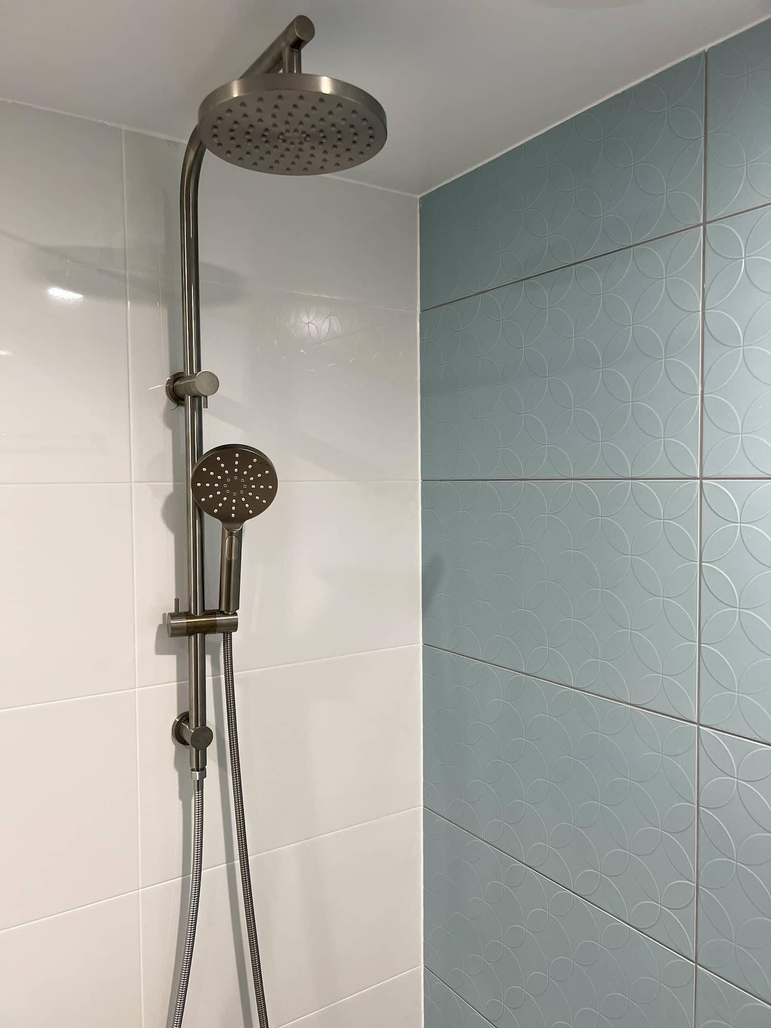Shower Head is Hanging From the Ceiling — Nyblad Construction in Caloundra West, QLD