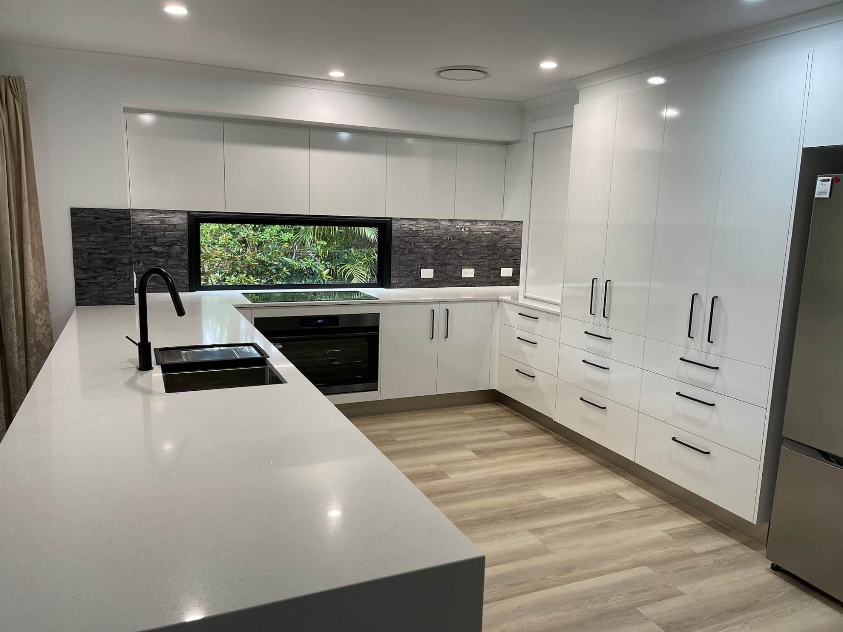 Kitchen With White Cabinets — Nyblad Construction in Caloundra West, QLD