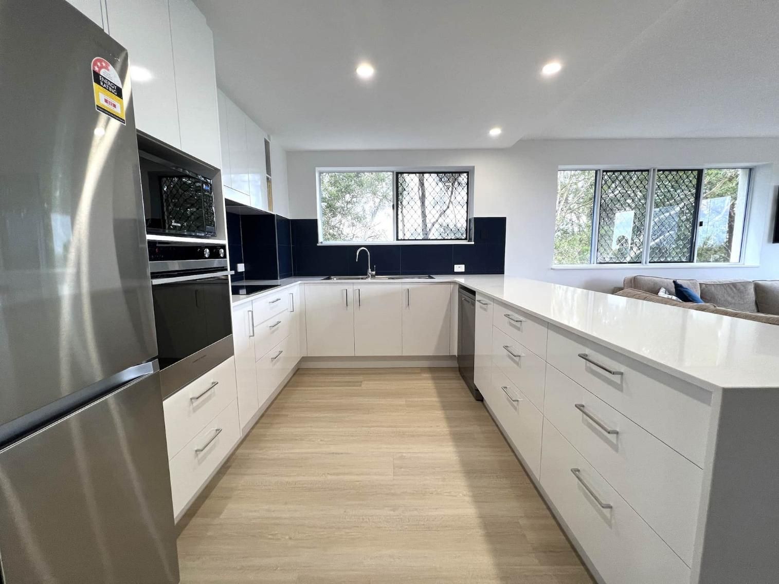 Kitchen With White Cabinets — Nyblad Construction in Caloundra West, QLD