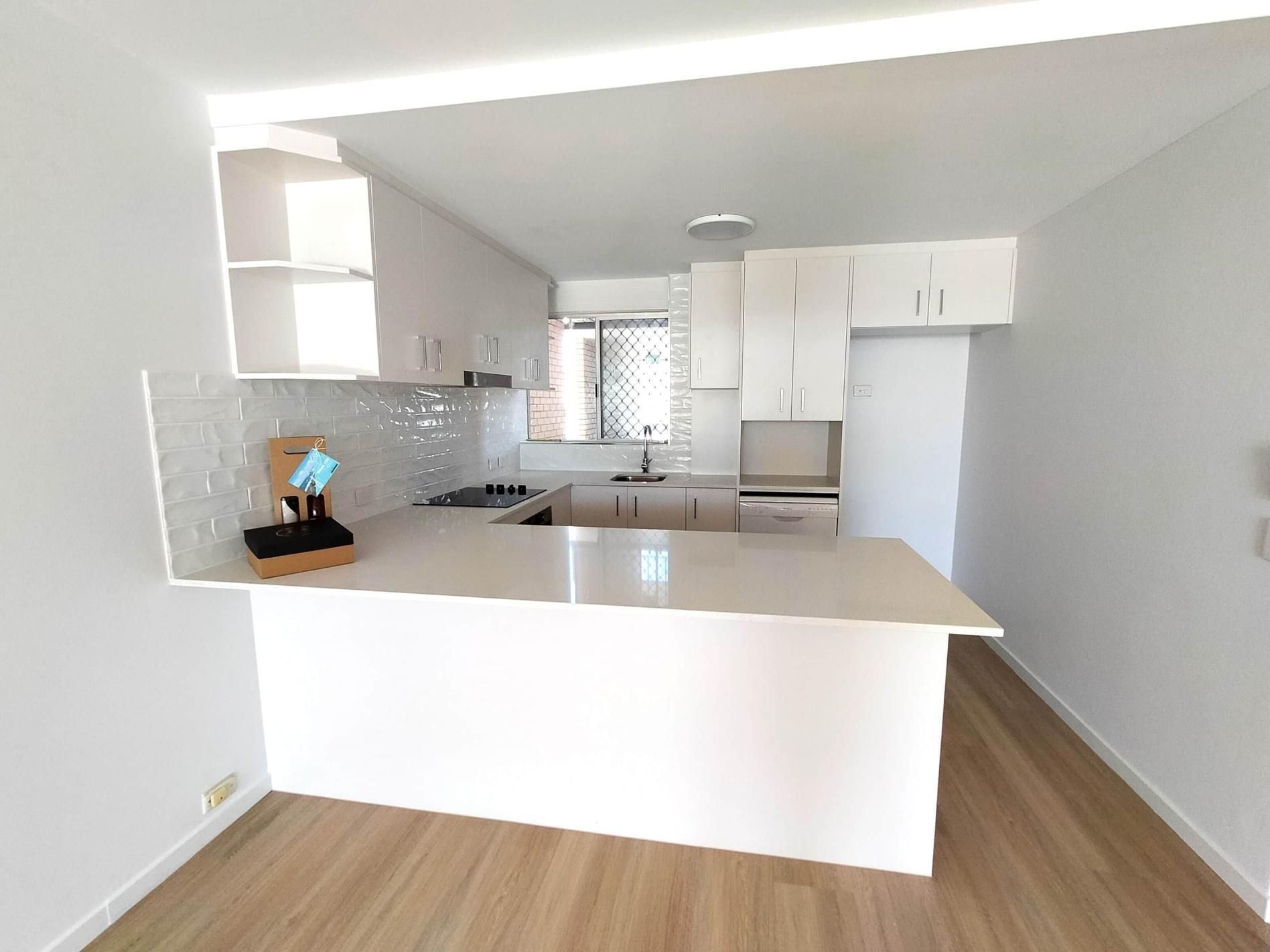Kitchen With White Cabinets — Nyblad Construction in Caloundra West, QLD