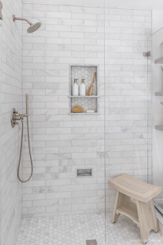 A Bathroom With Wooden Bench — Nyblad Construction in Caloundra West, QLD