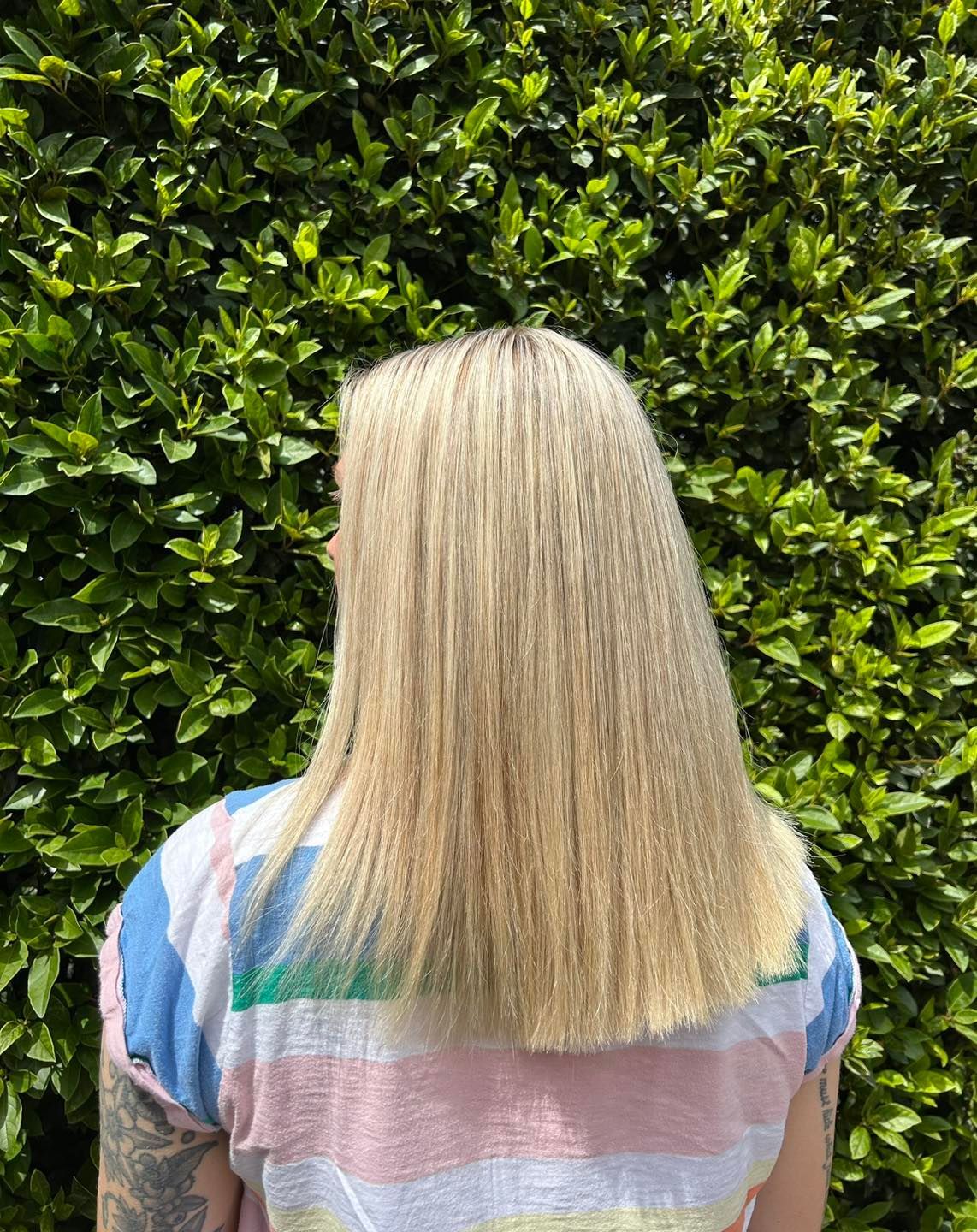 Blonde Hair With a Crimped Texture, the Person Stands — Elysian Salon In Wyong, NSW