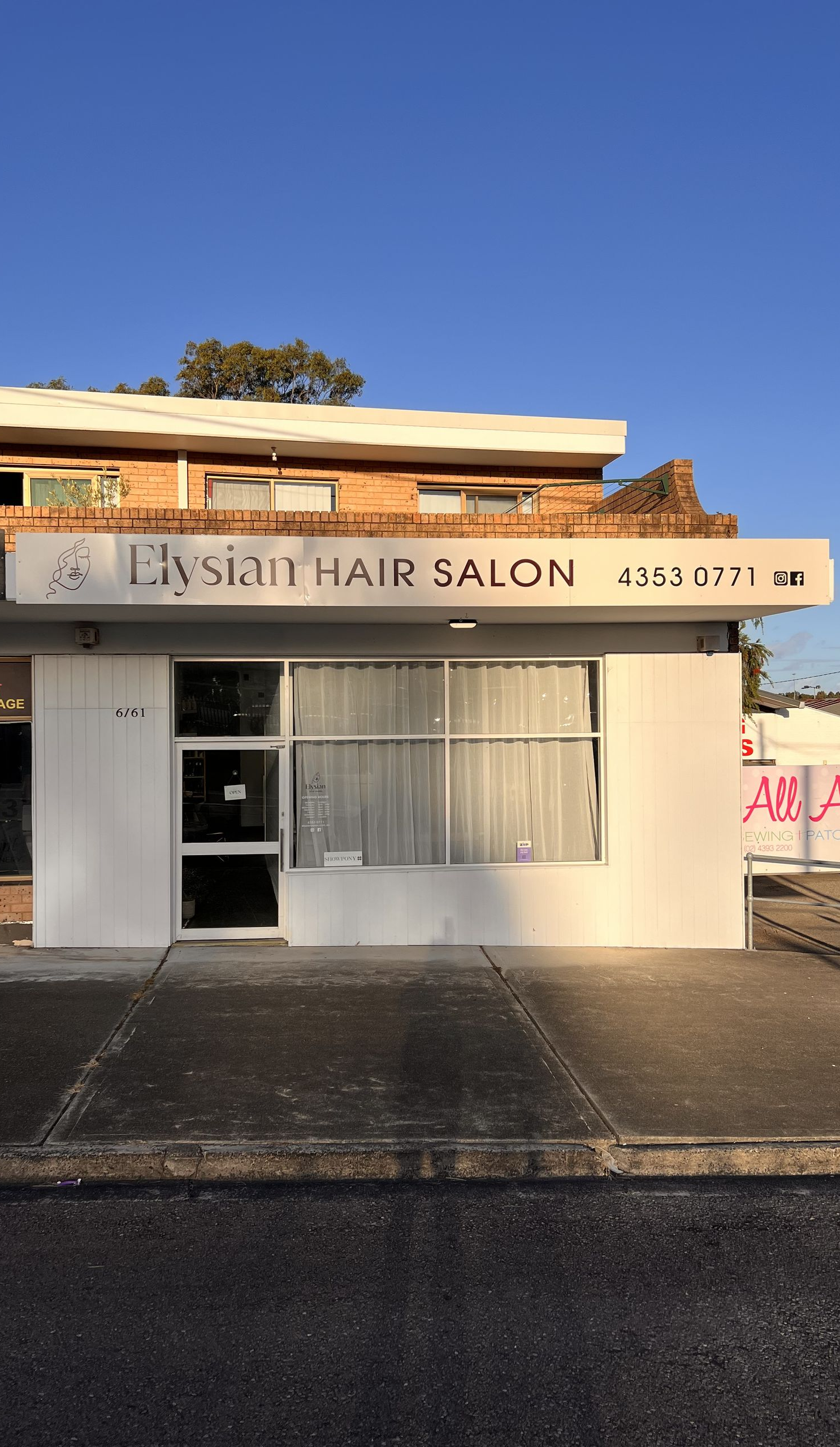 Exterior of a Nail Salon Pink Shop Nail & Beauty With a Truck Parked in Front — Elysian Salon In Wyong, NSW