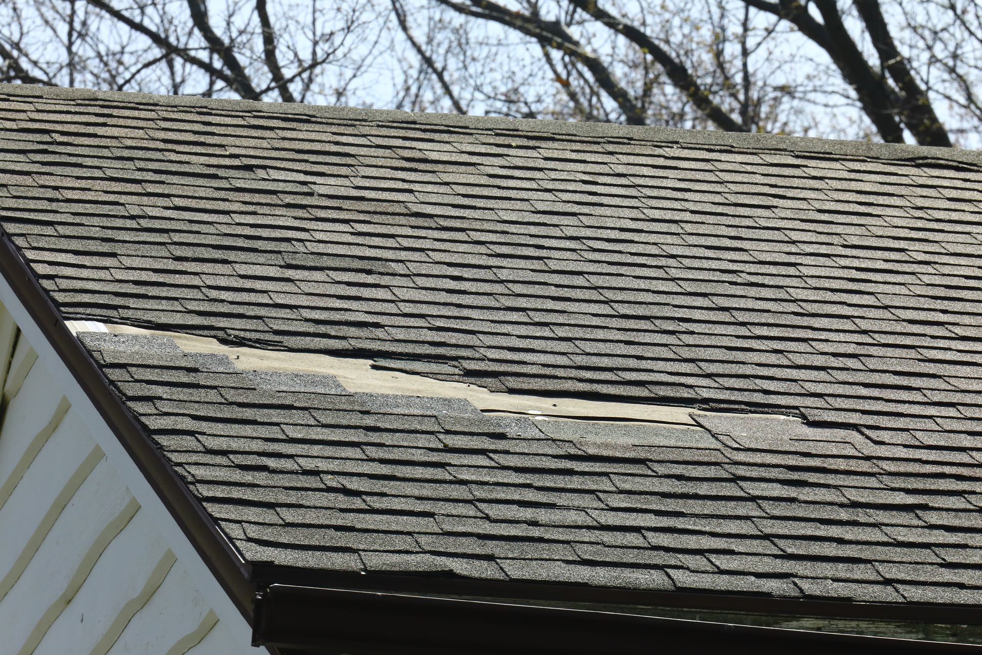 Damaged roof due to inclement weather.