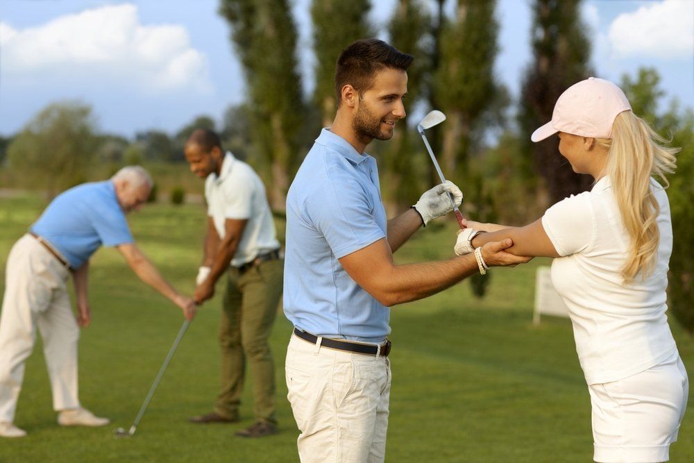Male Instructor Helping