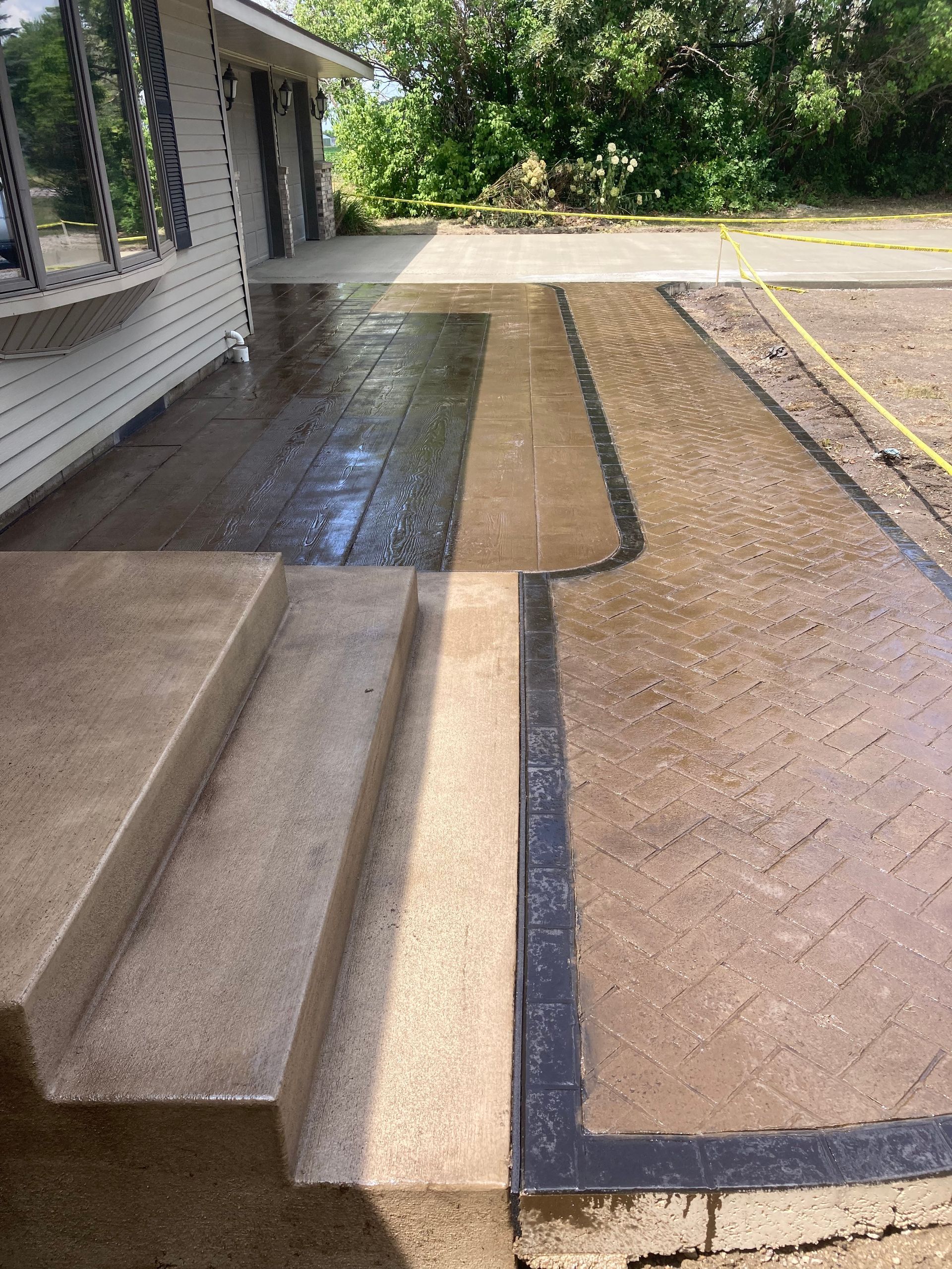 a picture of a concrete driveway and stairs