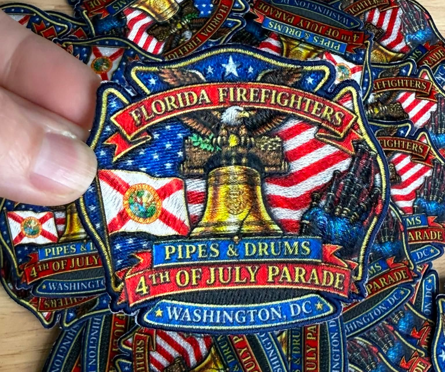 Florida Firefighters Pipes & Drums Washington, D.C. patch with bell, flags, and parade text