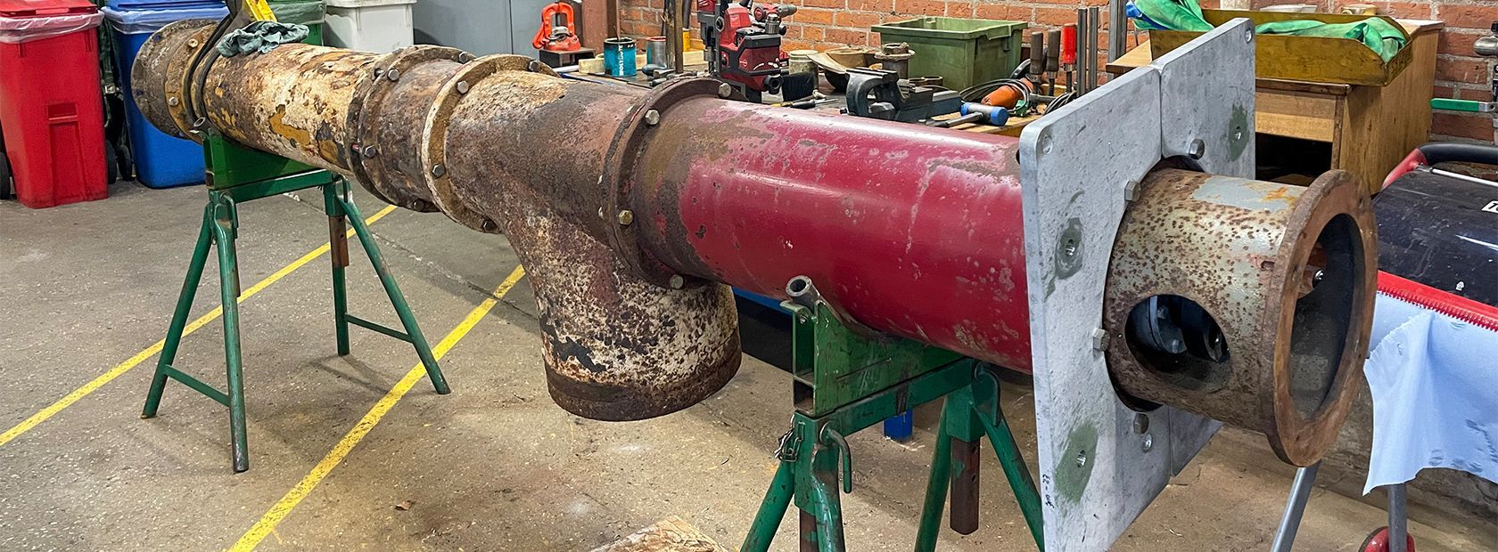 Old drainage pump is repaired with another old pump part 