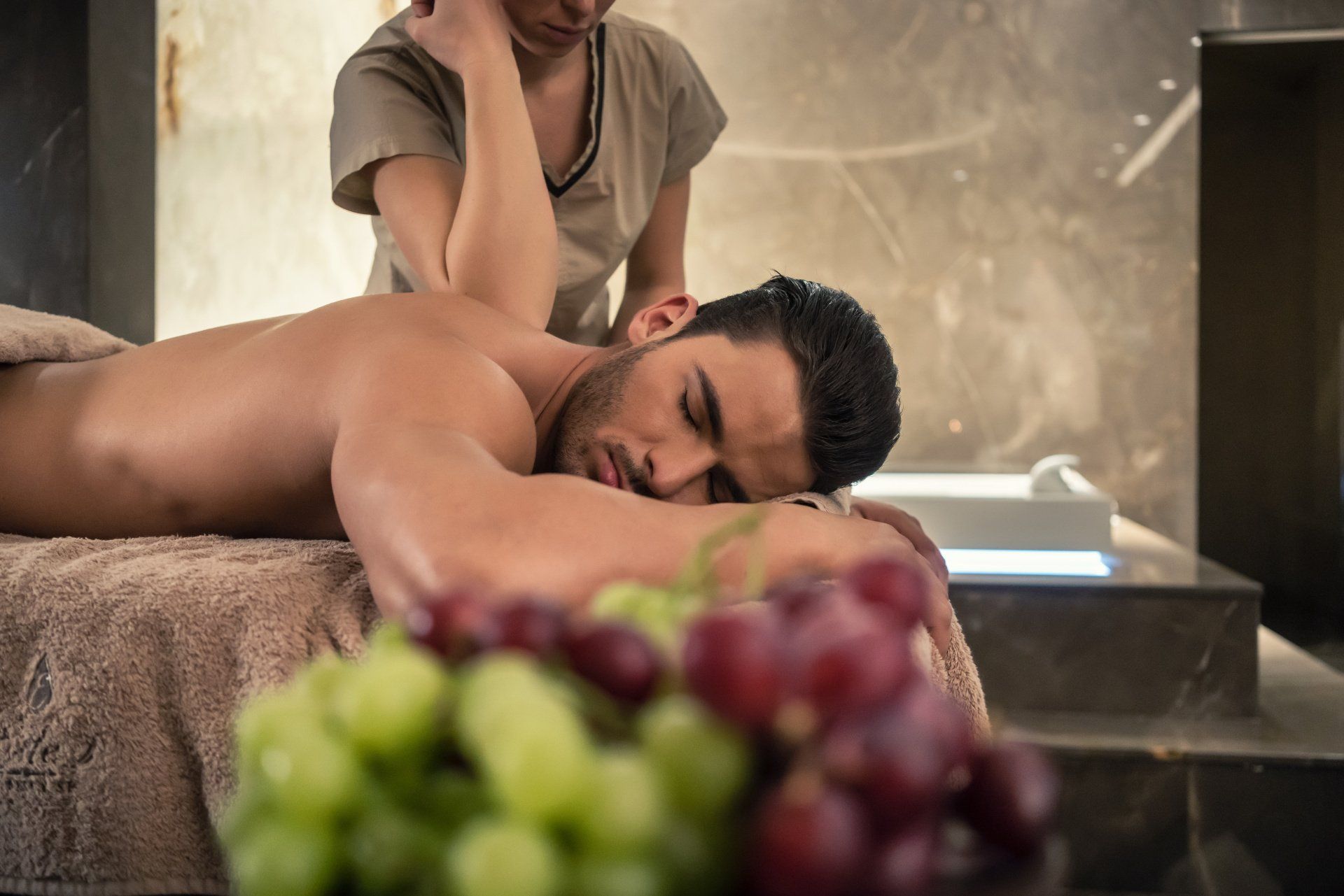 a man getting body massages