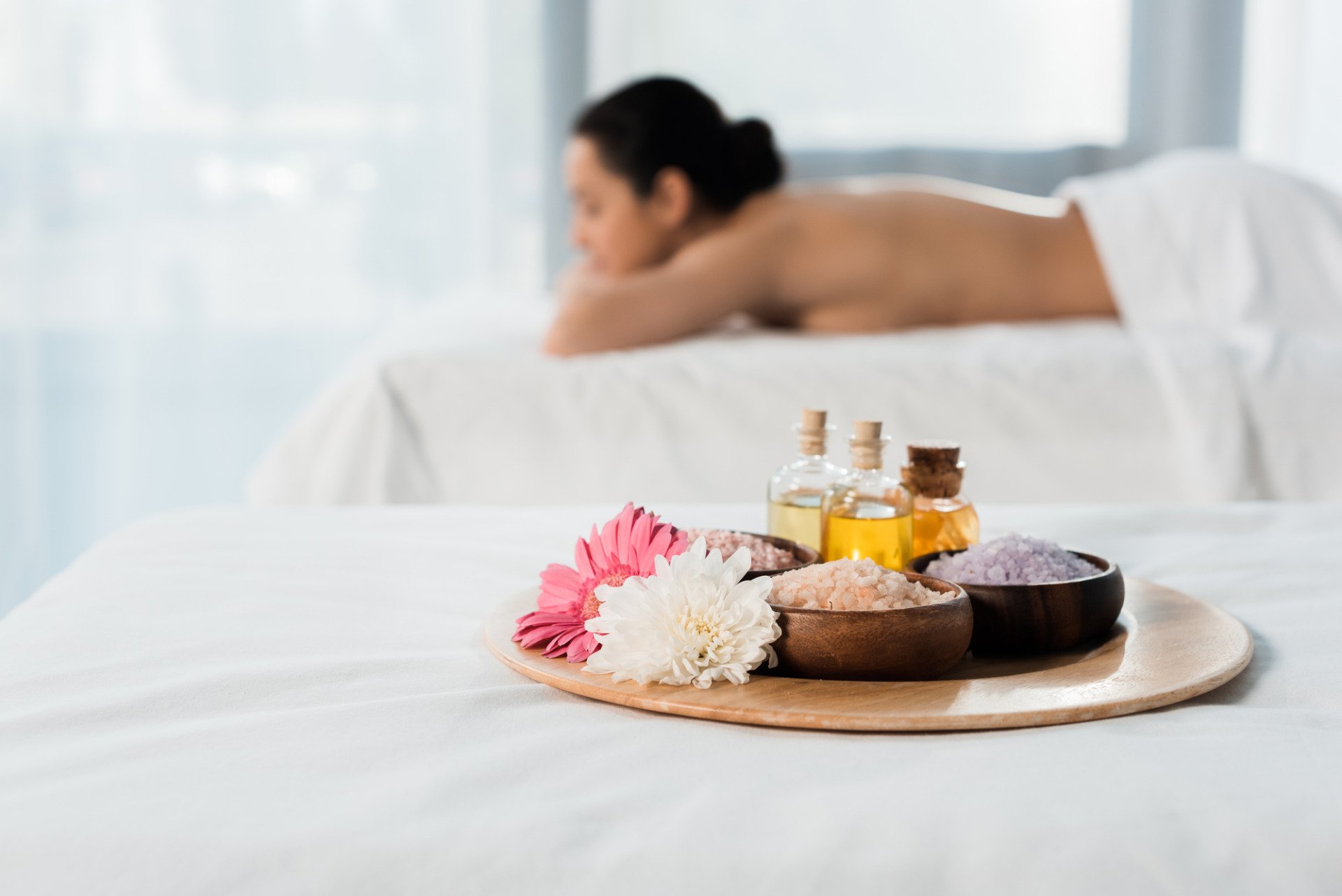 a woman who's about to get an aromatherapy massage