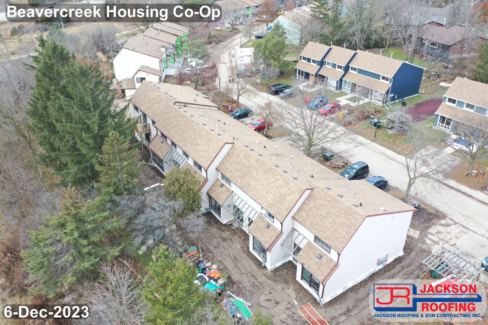 An aerial view of a row of houses under construction.