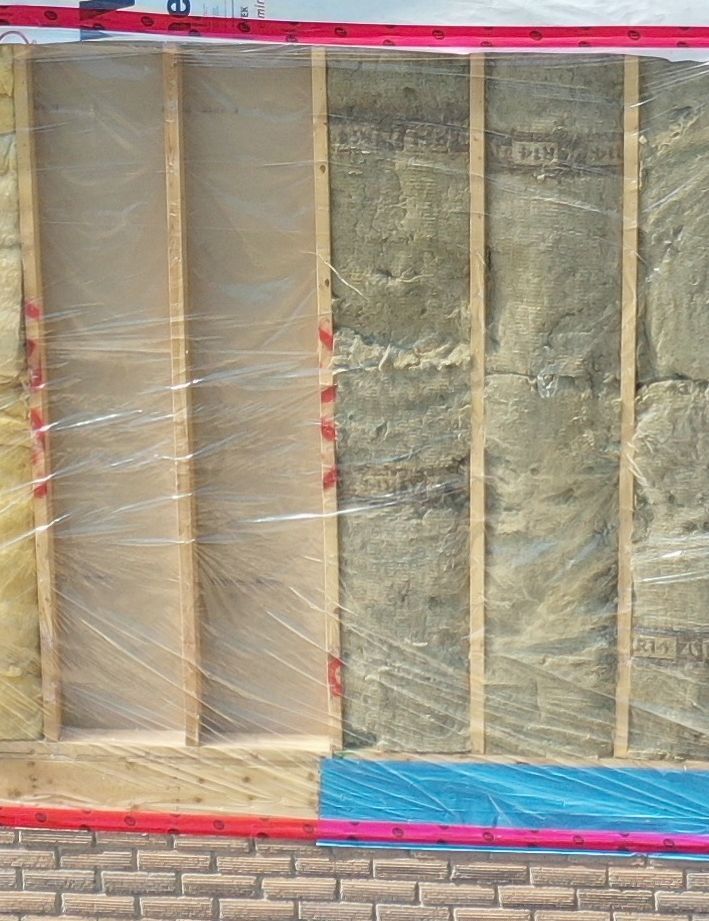 A brick wall with a lot of insulation on it.
