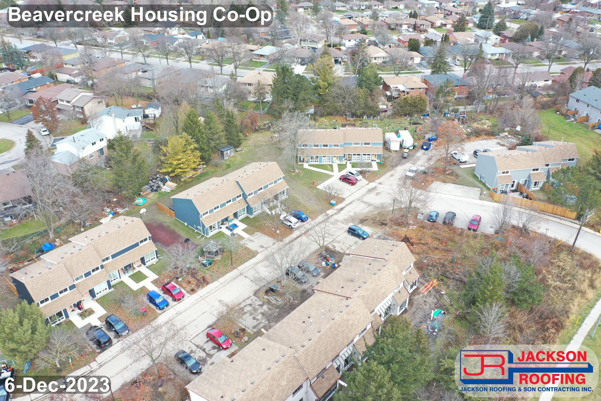 An aerial view of a row of houses in a residential area.
