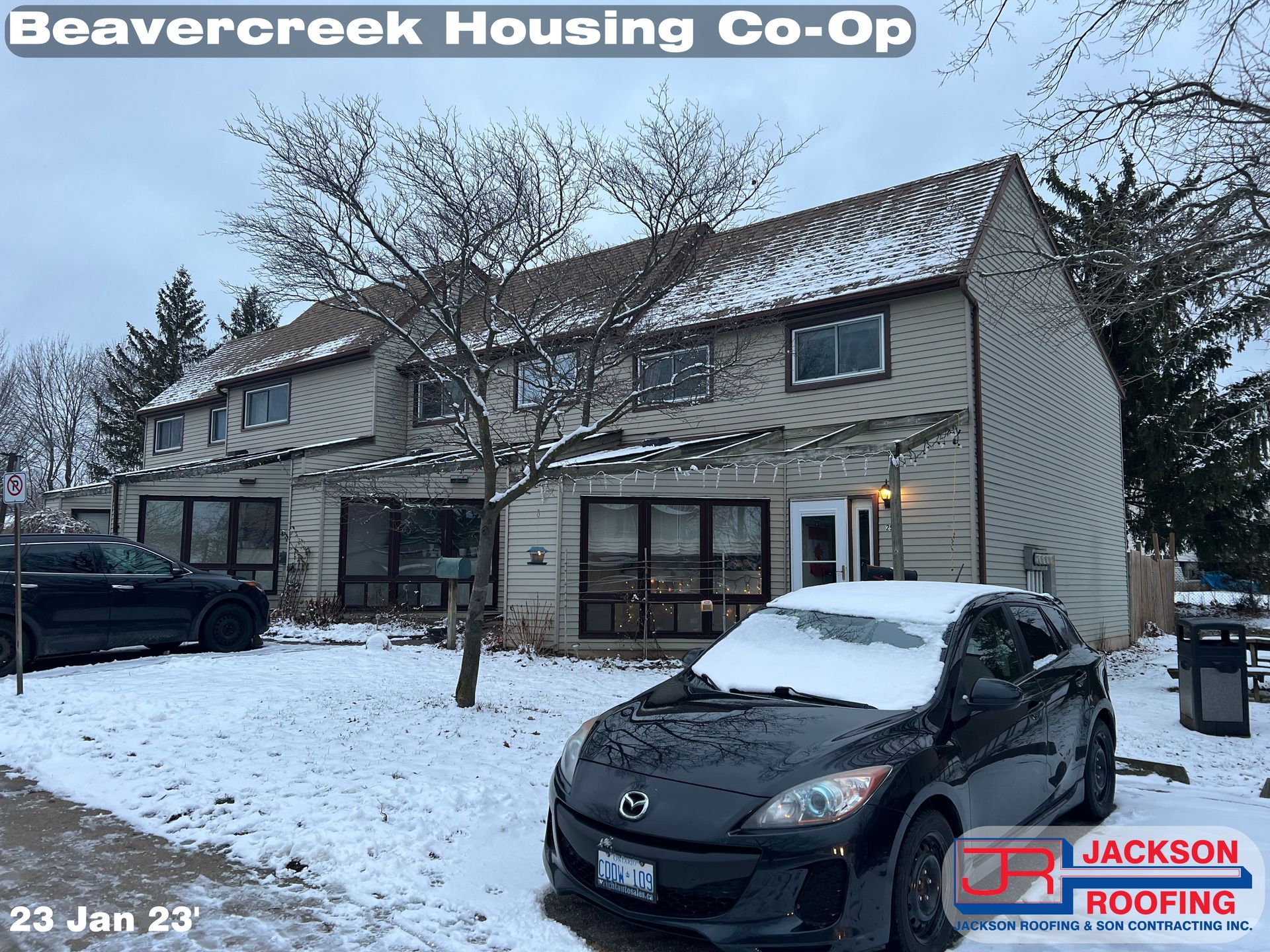 A car is parked in front of a beavercreek housing co-op