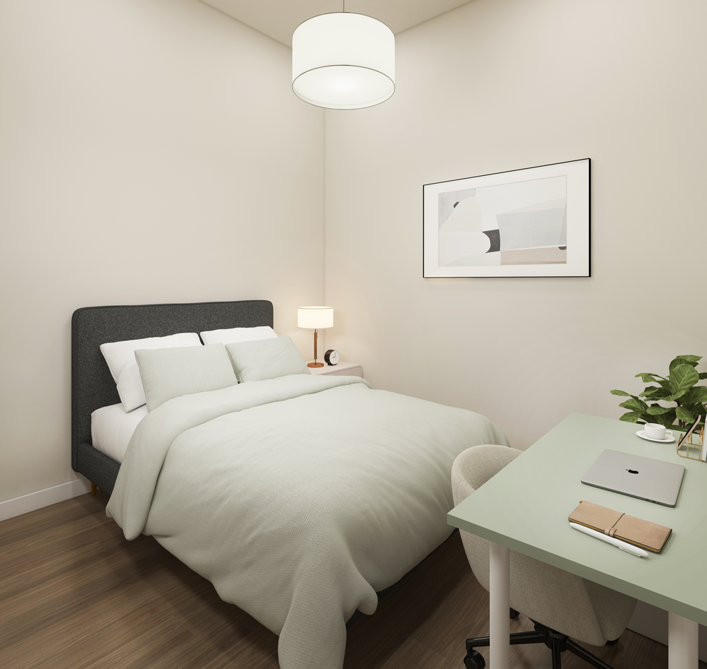 A bedroom with a bed , desk and chair