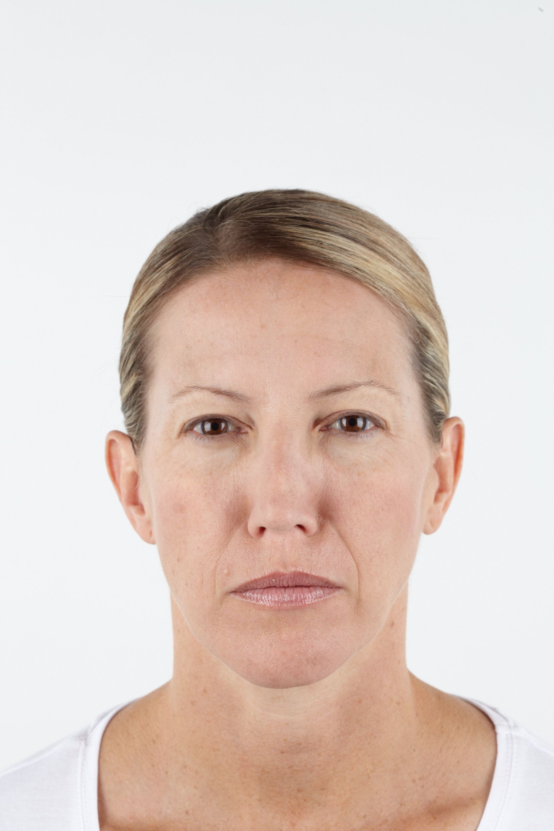 Woman with blonde hair, neutral expression, facing forward. Against a white background.