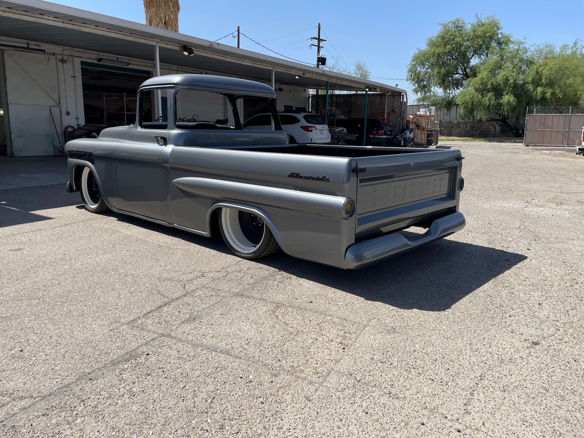 the back end of a silver truck