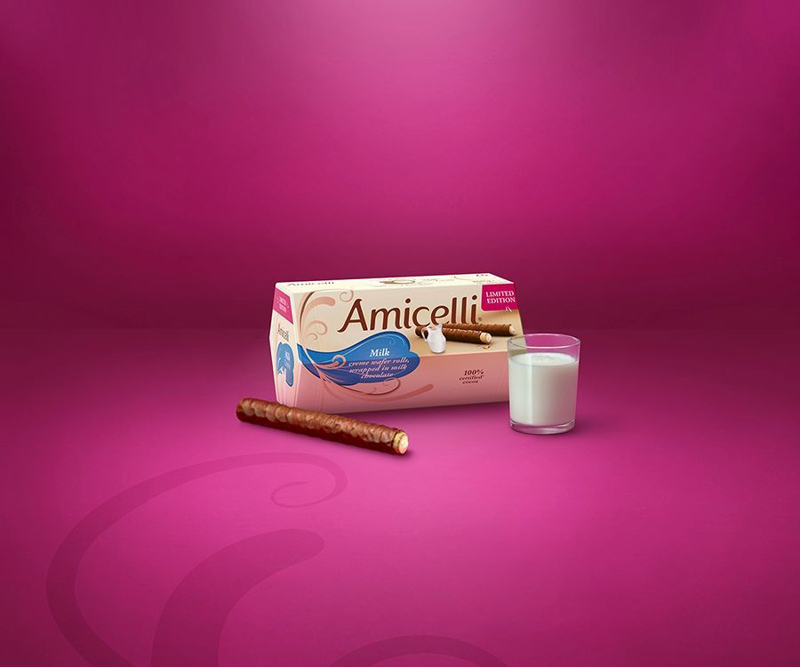 A box of amicelli milk wafer rolls and glass of milk on a purple background.