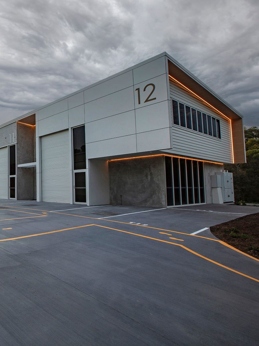 A modern, two-story commercial building labeled 