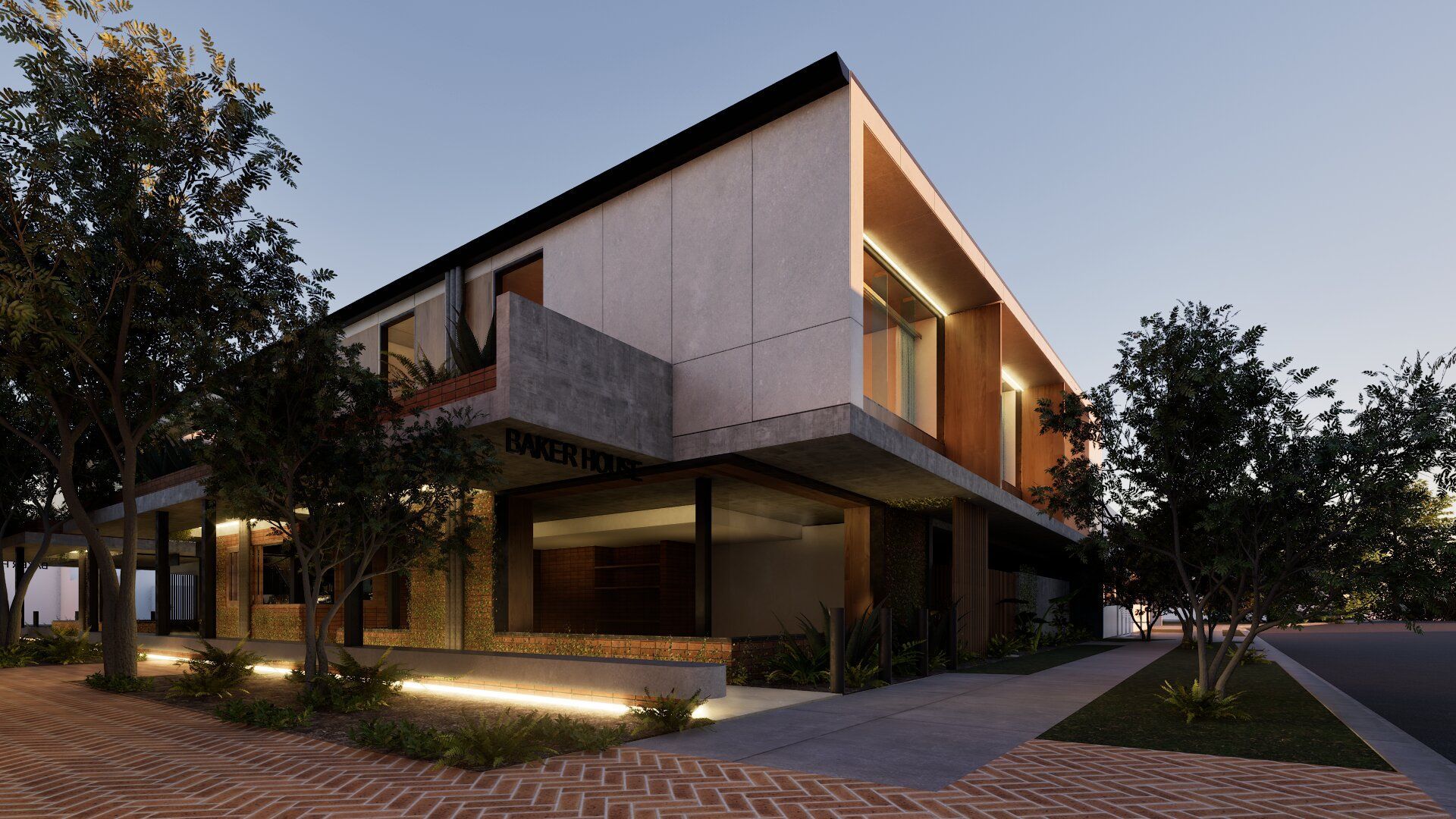 Modern office building exterior at dusk with concrete facade, warm lighting and landscaped surroundings.