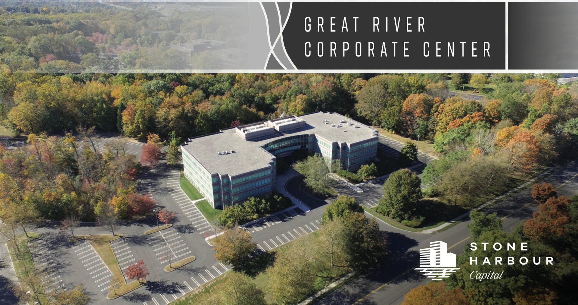 Aerial view of the Great River Corporate Center in autumn. Stone Harbor logo in corner.