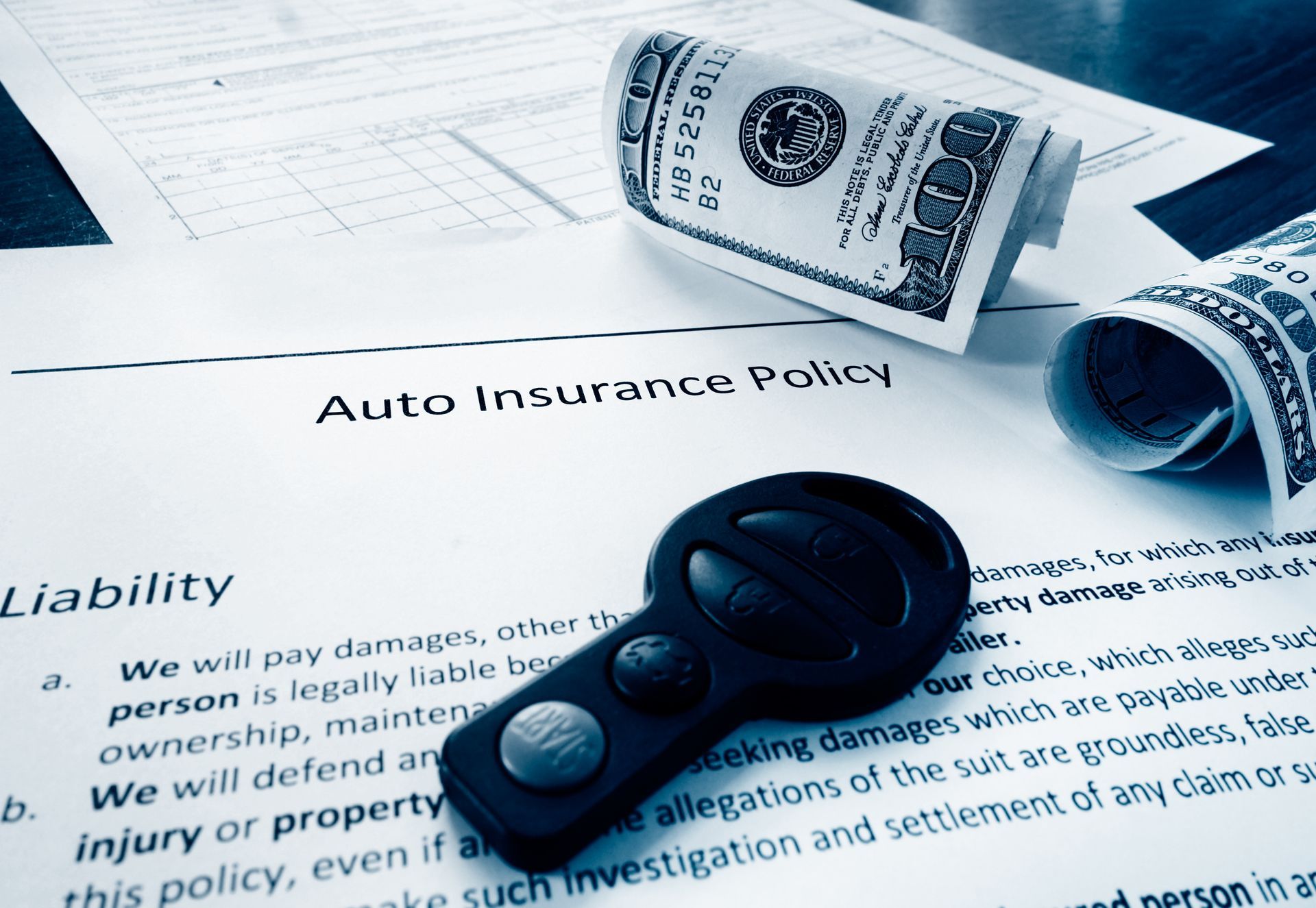 Document that reads ‘Auto Insurance Policy’ Document that reads ‘Auto Insurance Policy’