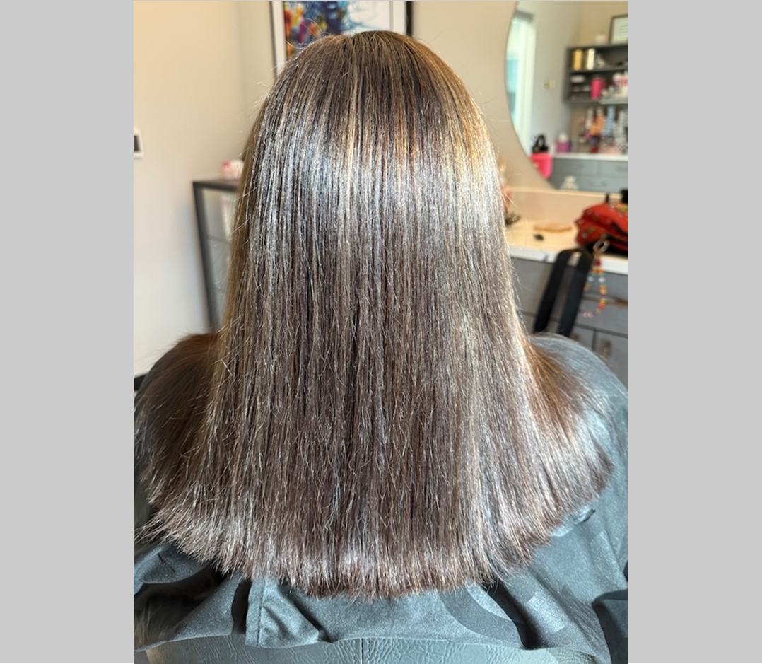 After picture of a woman's hair texturing. It is very smooth soft and shiny.