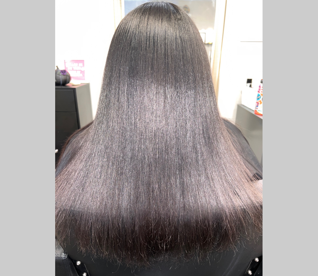 After picture of a woman's hair texturing. It is very smooth soft and shiny.