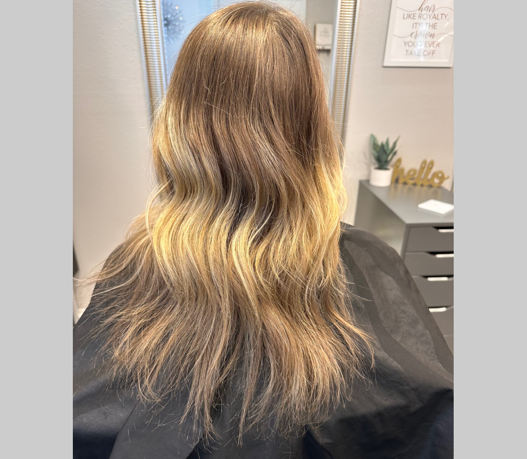 Before picture of a woman's hair. Before hair extensions.