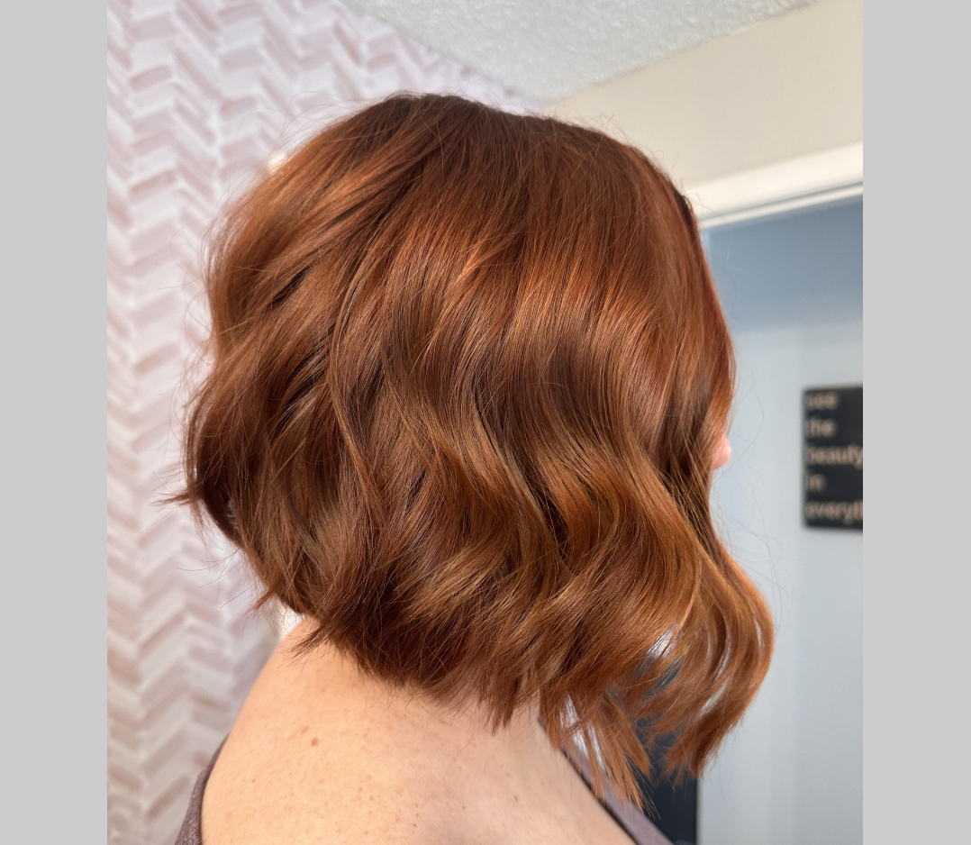 After pict of a short red-headed haircut.