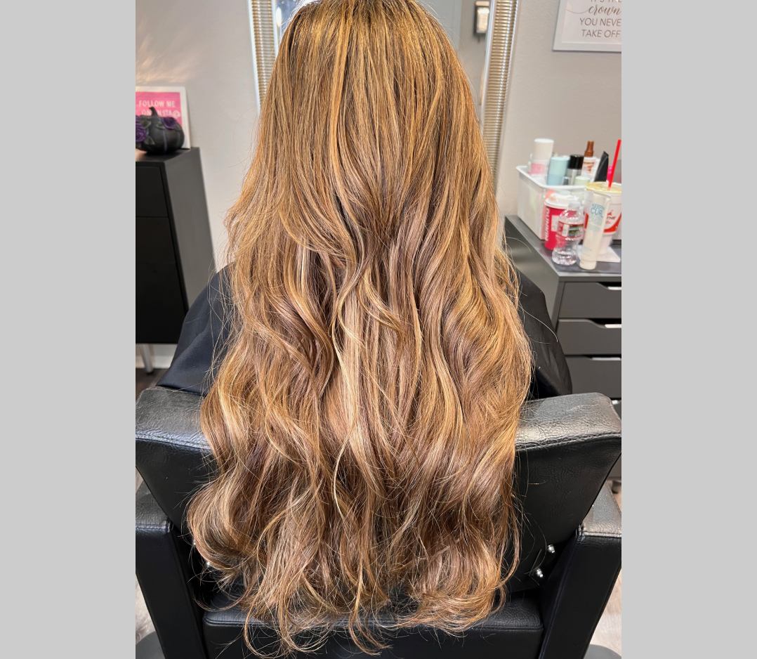 After picture of a moan's hair with long thick extensions.