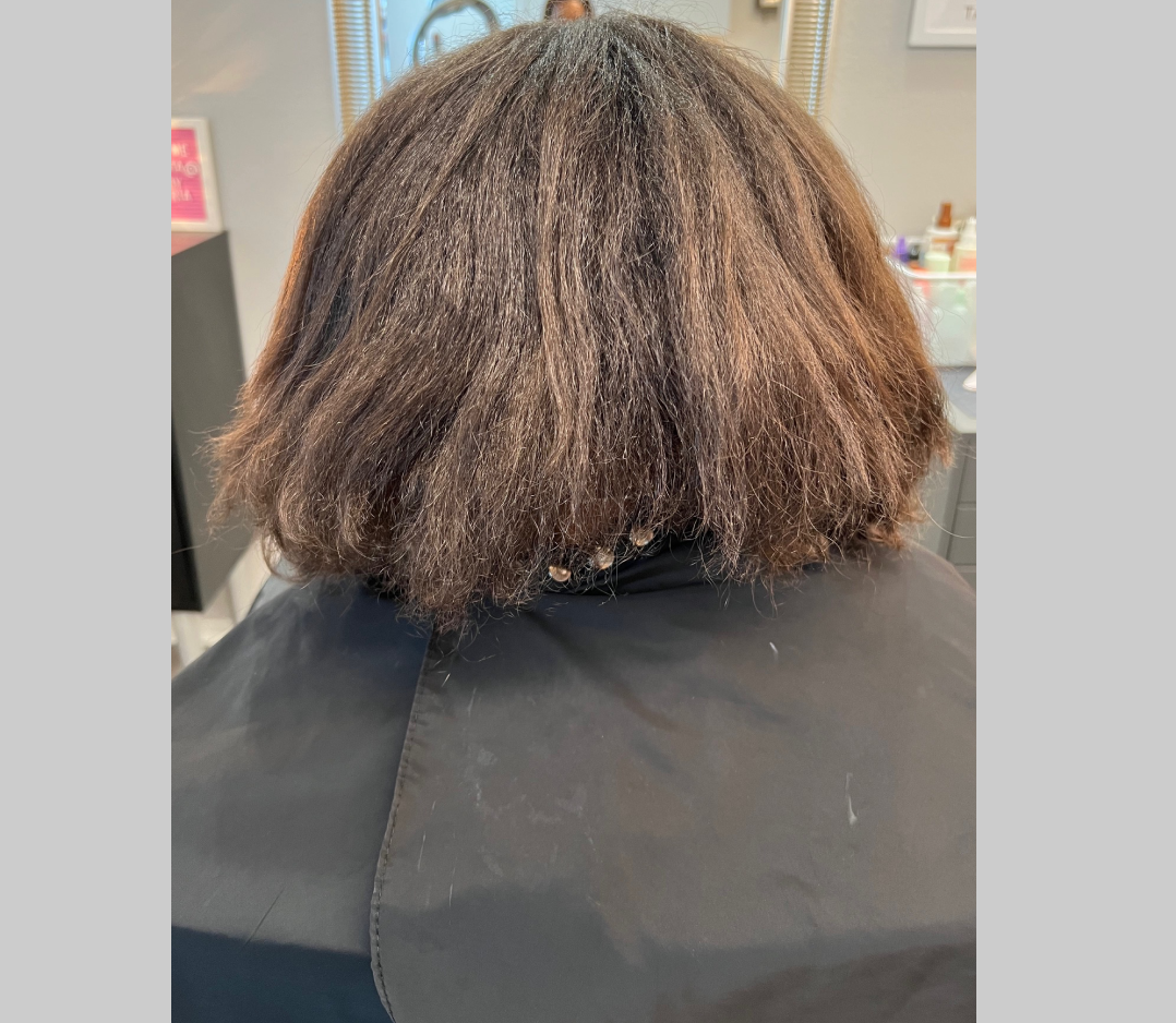 Very short and thick and extremely curly hair. 