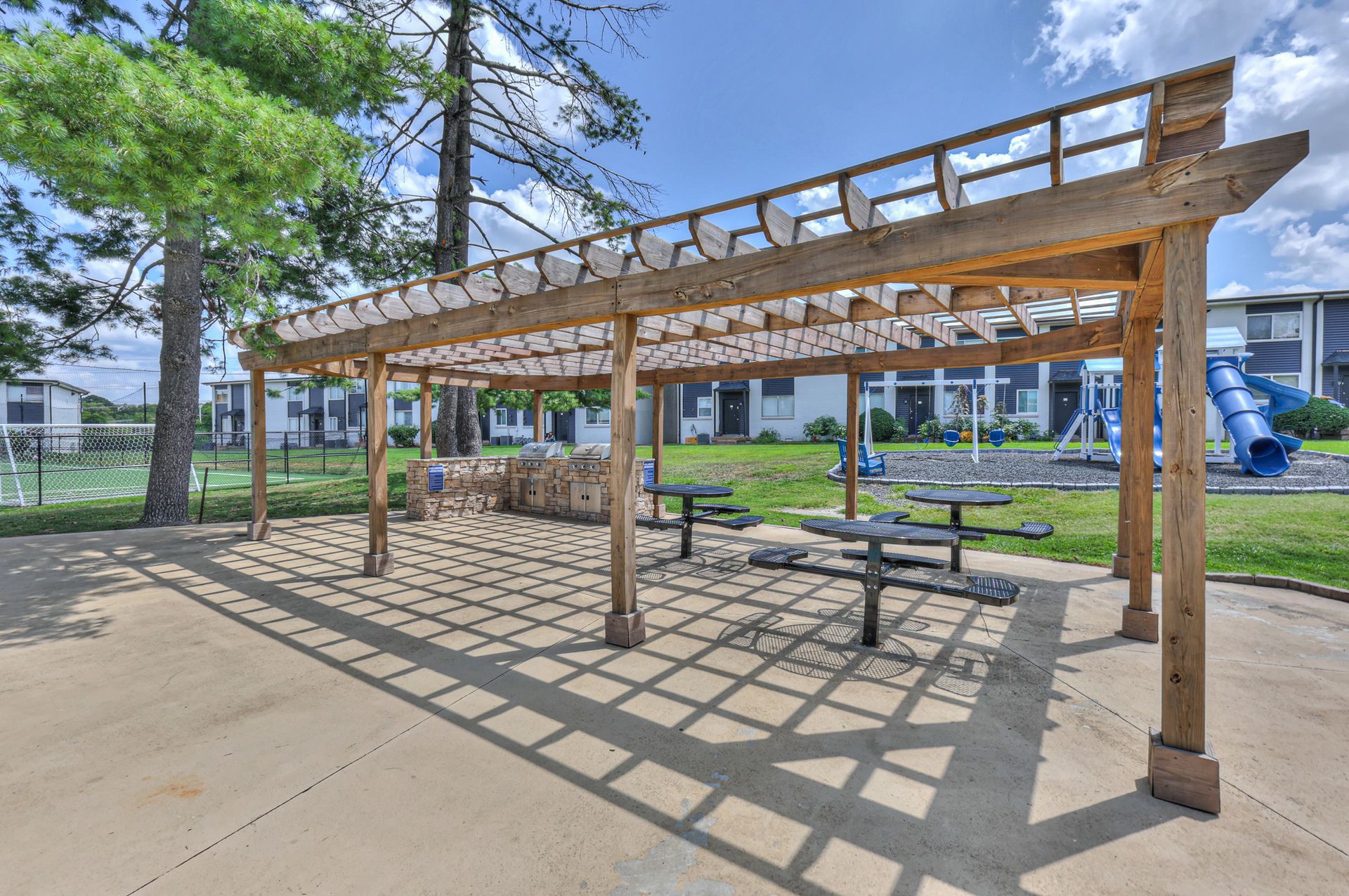 Photo of a community grill, with a couple of areas to sit