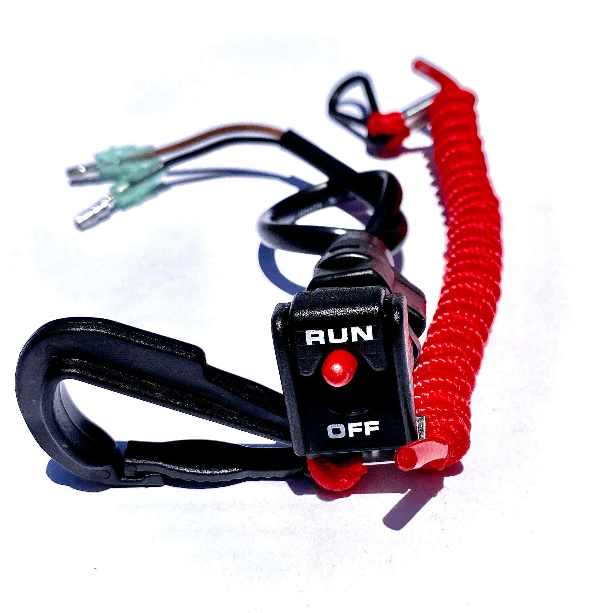 Red and black toggle switch with RUN/OFF labels and attached wires on a white background