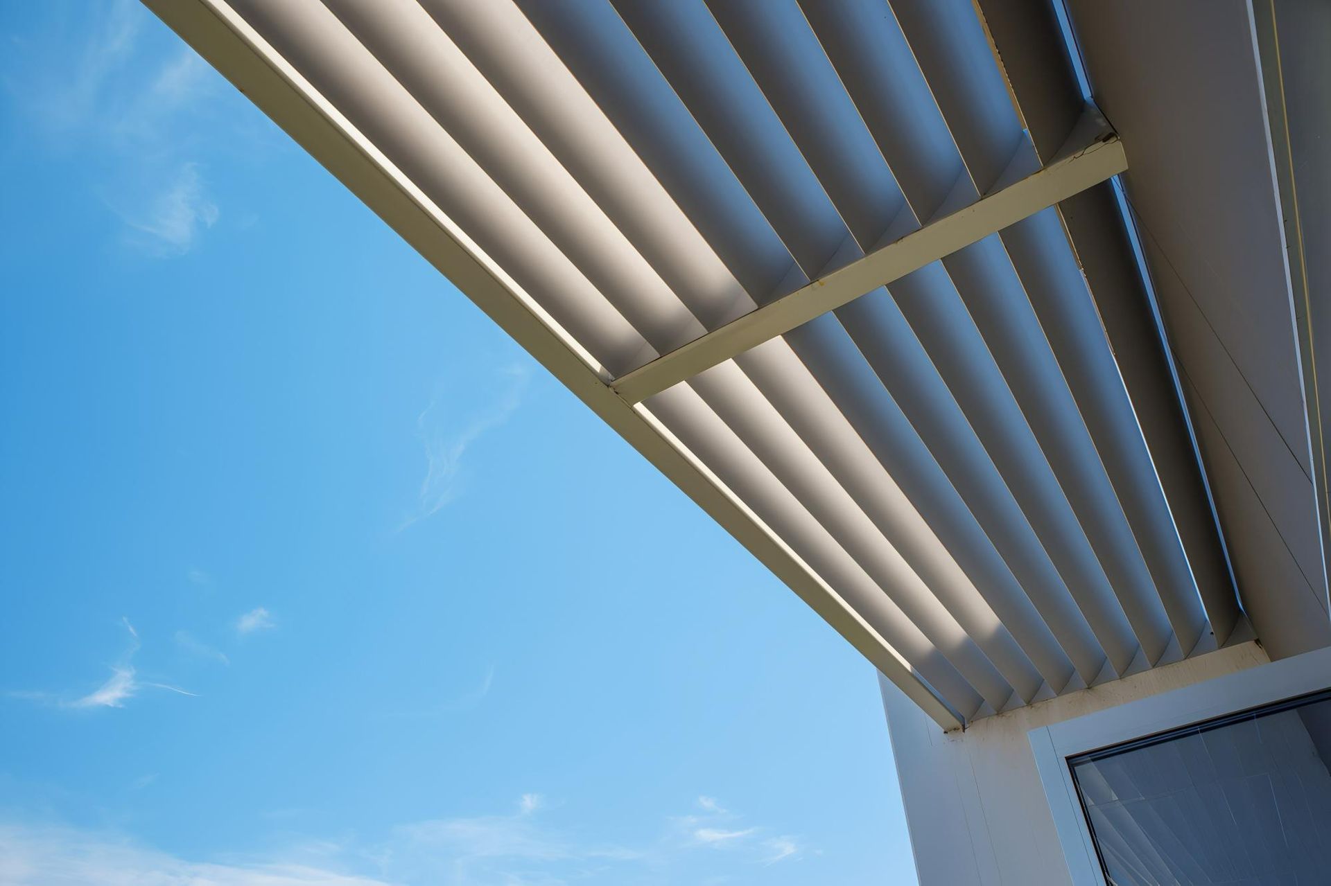 Beige Louvered Awning With Horizontal Slats — JSF Interiors Goulburn in Goulburn, NSW