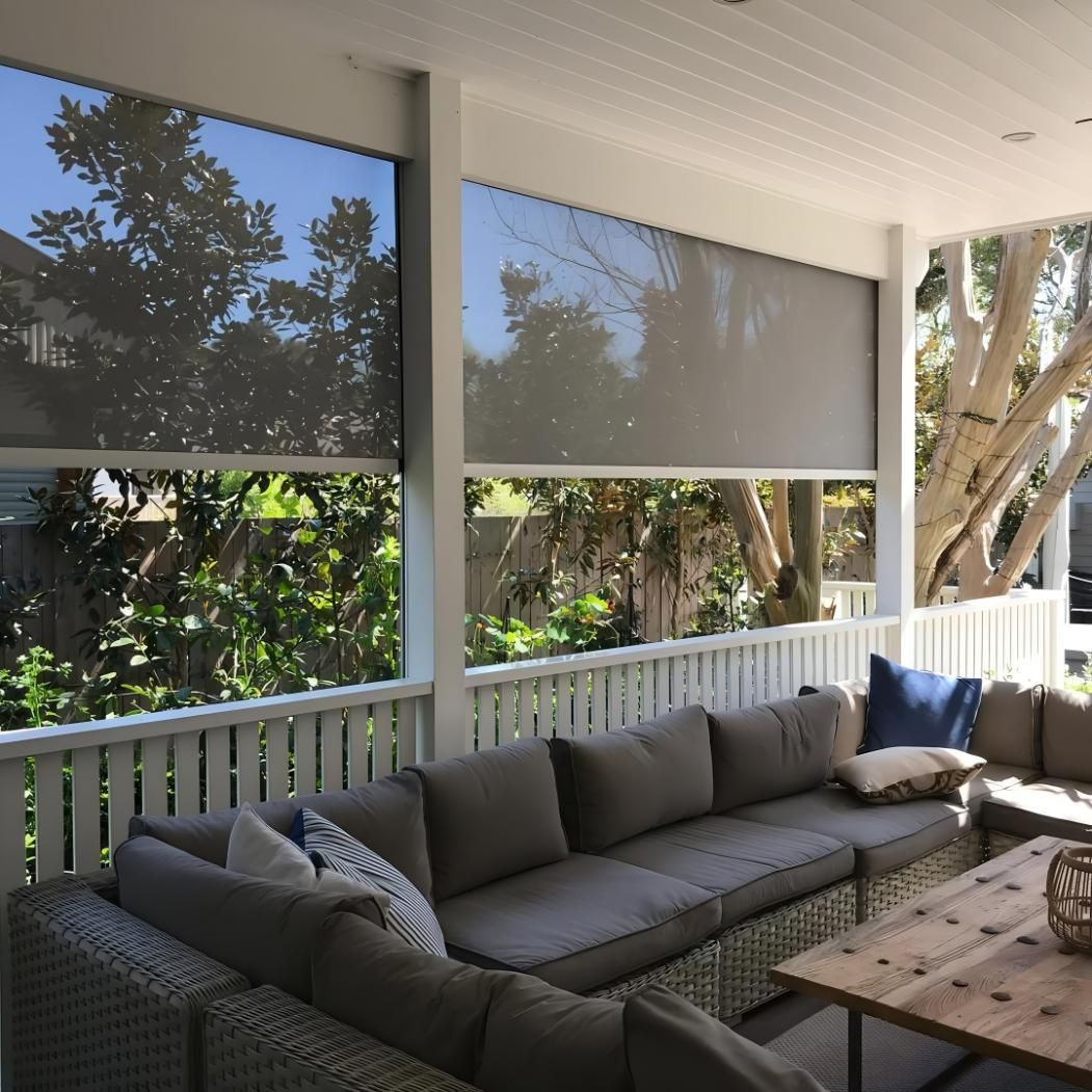 Outdoor Patio With Gray Sectional Sofa And Sunshades — JSF Interiors Goulburn in Goulburn, NSW