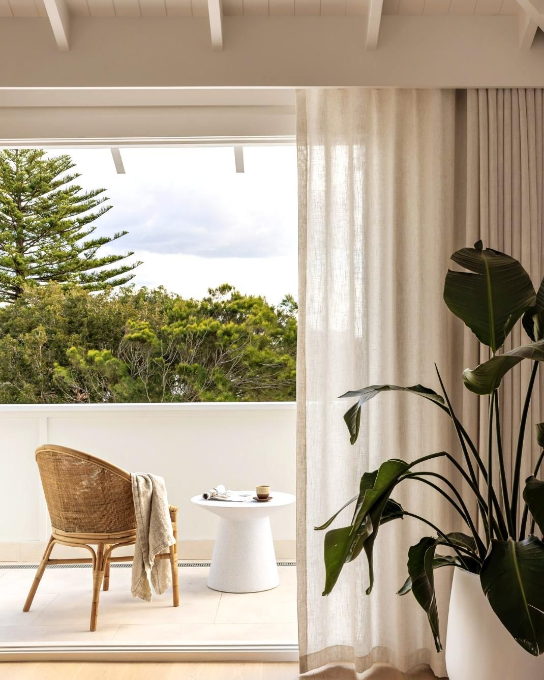 Wicker Chair and Table on Balcony — JSF Interiors Goulburn in Shellharbour, NSW