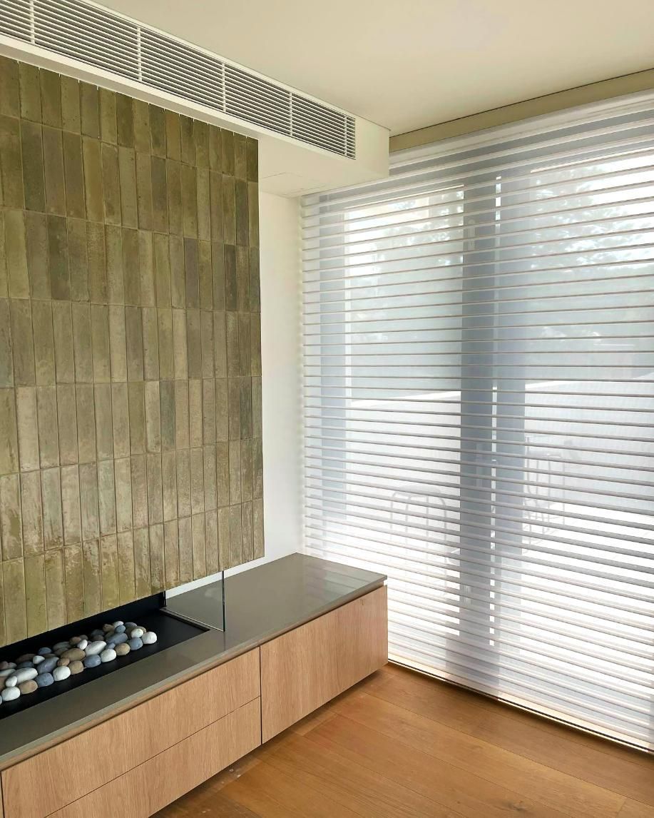 Living Room With Stone Fireplace And Horizontal-Slat Blinds — JSF Interiors Goulburn in Bowral, NSW
