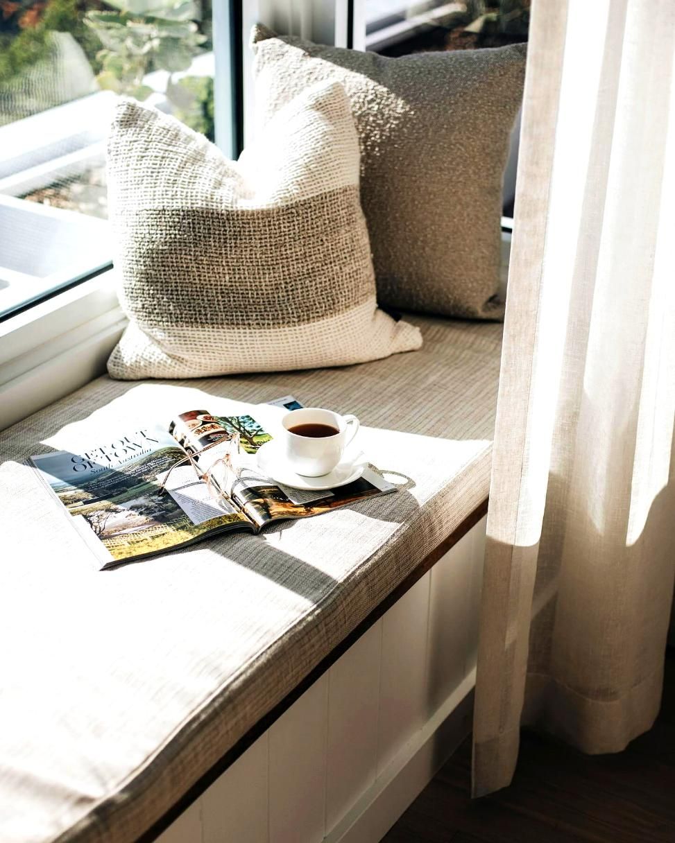 Window Seat With Pillows And Coffee Cup — JSF Interiors Goulburn in Moss Vale, NSW