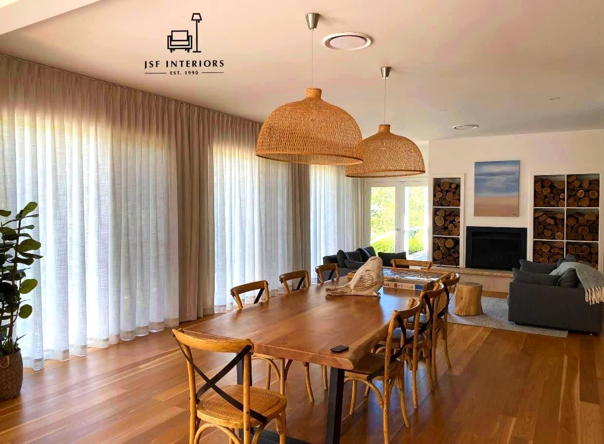 Spacious Dining Room With Wooden Table And Pendant Lights — JSF Interiors Goulburn in Berry, NSW