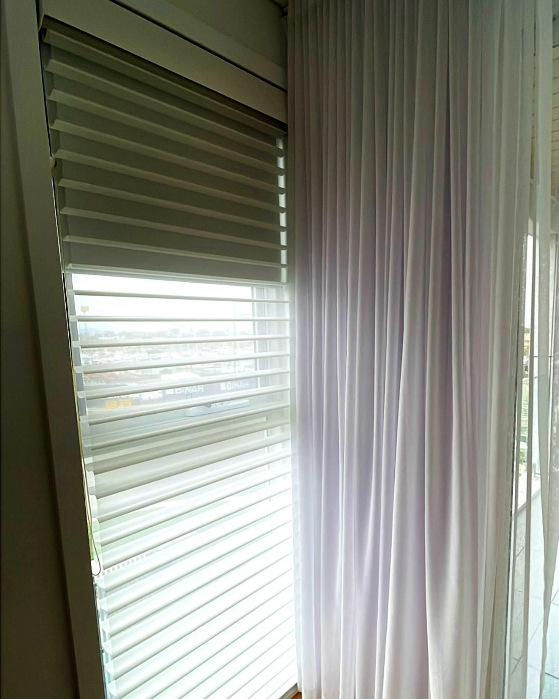 White Blinds And Sheer Curtains Letting In Sunlight — JSF Interiors Goulburn in Bowral, NSW