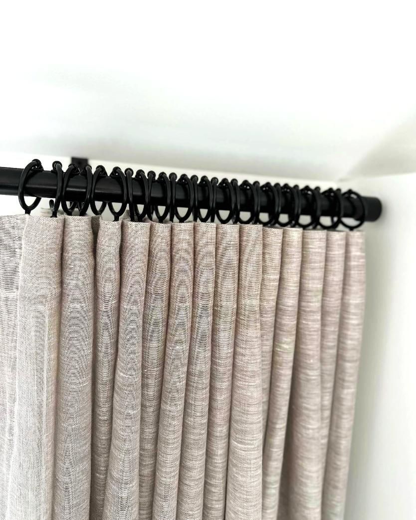 Black Curtain Rod With Pleated Beige Curtains — JSF Interiors Goulburn in Gerringong, NSW
